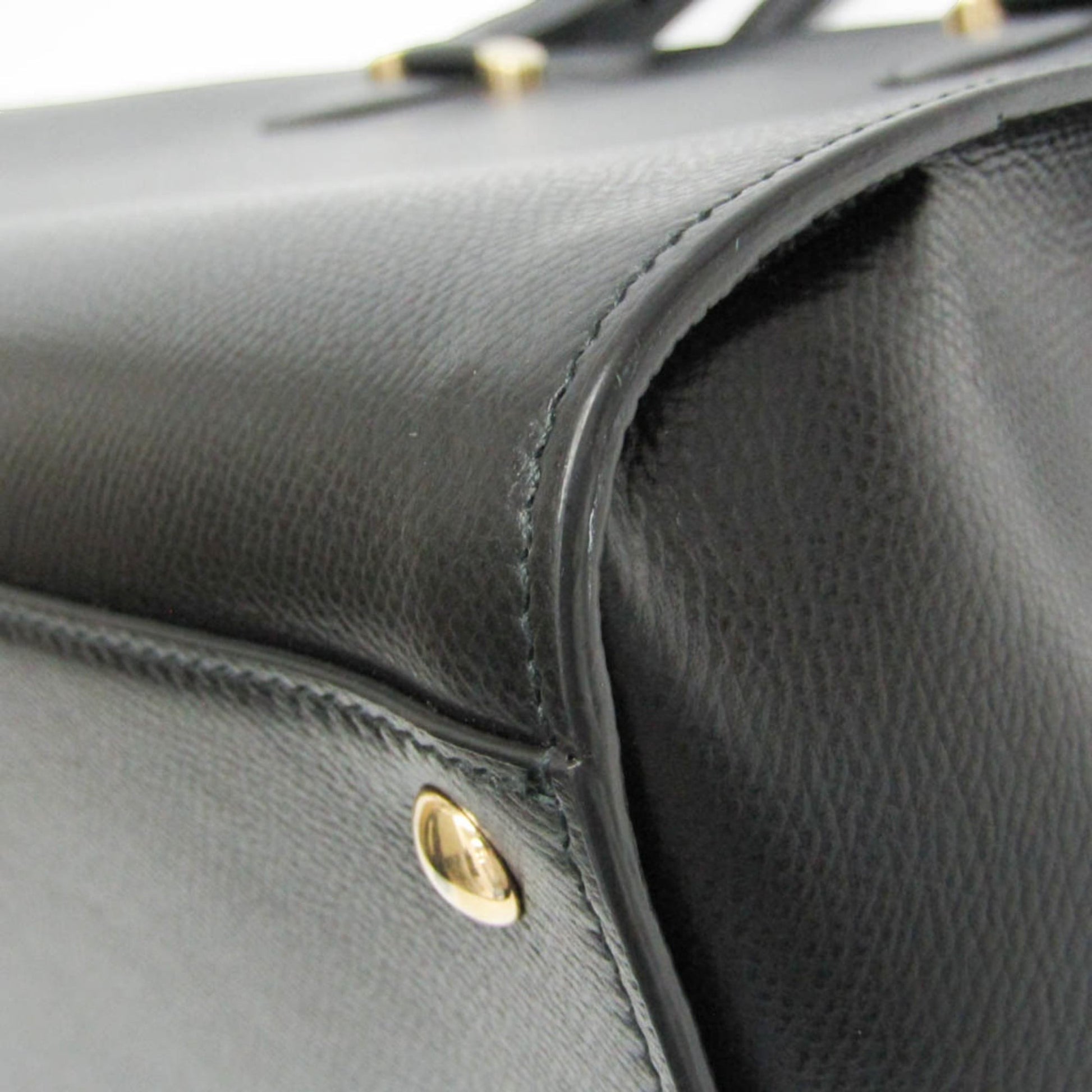 tokyopieces.com pre-owned Salvatore Ferragamo Today tote in black textured leather with gold-tone hardware detail.