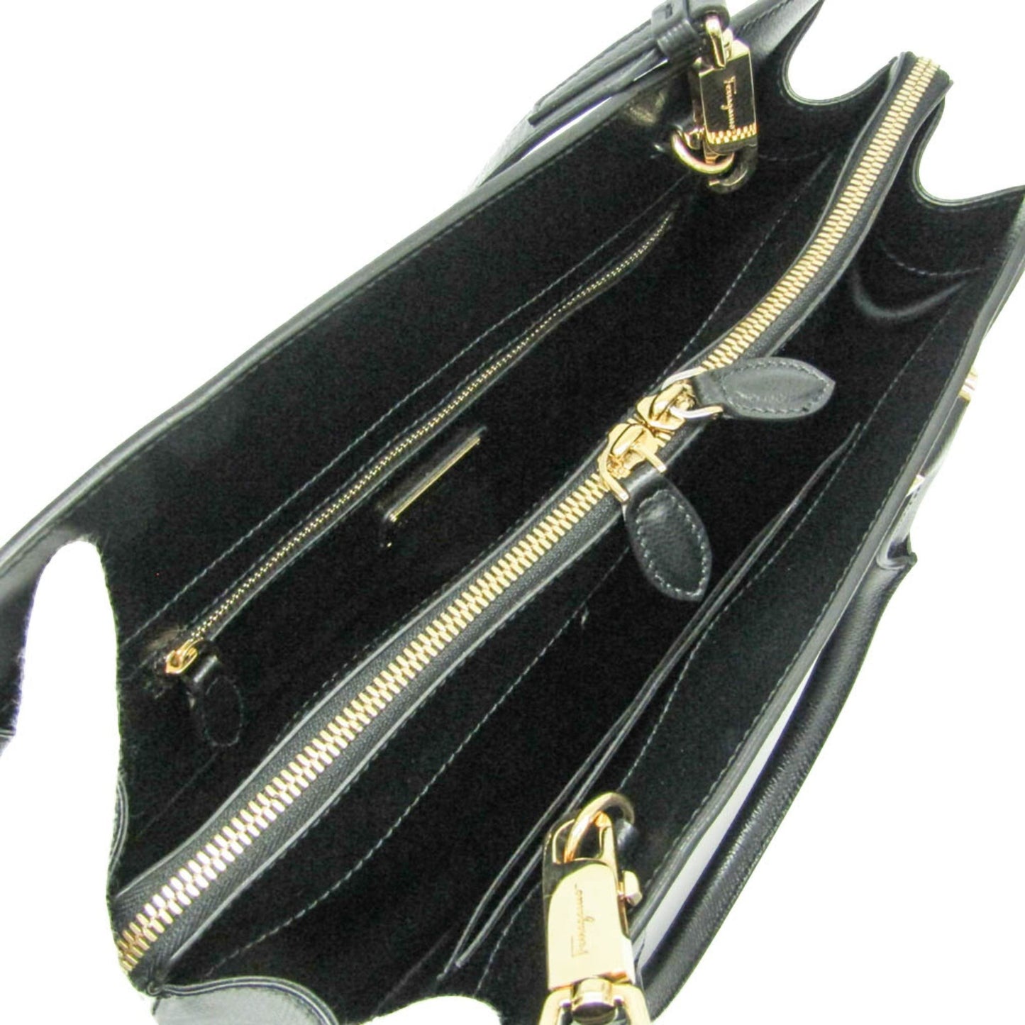 Interior view of tokyopieces.com pre-owned Salvatore Ferragamo Today black leather tote with gold hardware details.