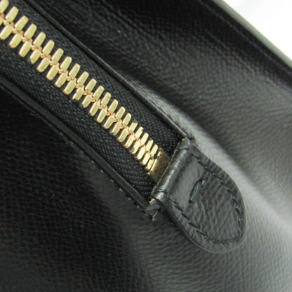 Close-up of gold-tone zipper detail on a black leather Salvatore Ferragamo Today tote bag from tokyopieces.com