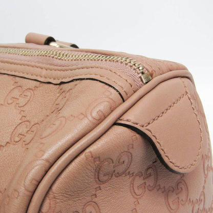 tokyopieces.com Gucci Guccissima blush pink leather Boston bag with embossed monogram and zip closure.