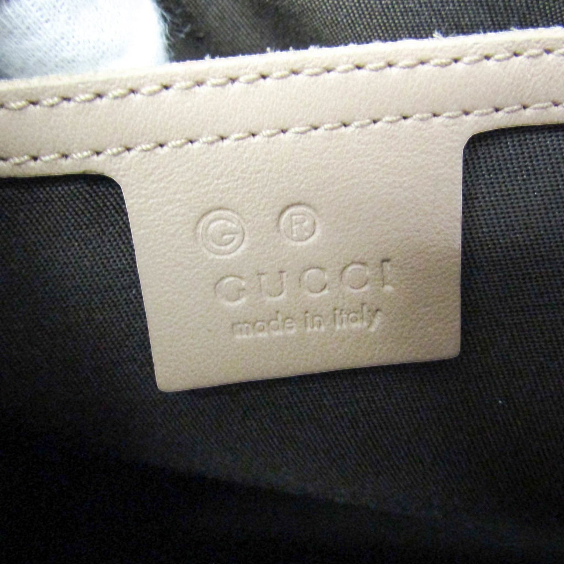 tokyopieces.com Gucci Guccissima blush pink beige leather Boston bag with embossed monogram.