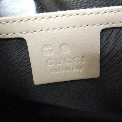 tokyopieces.com Gucci Guccissima blush pink beige leather Boston bag with embossed monogram.