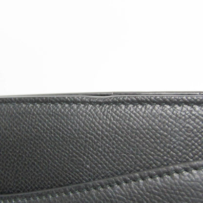 Close-up of black textured leather on a tokyopieces.com Salvatore Ferragamo Today tote bag showing fine stitching.